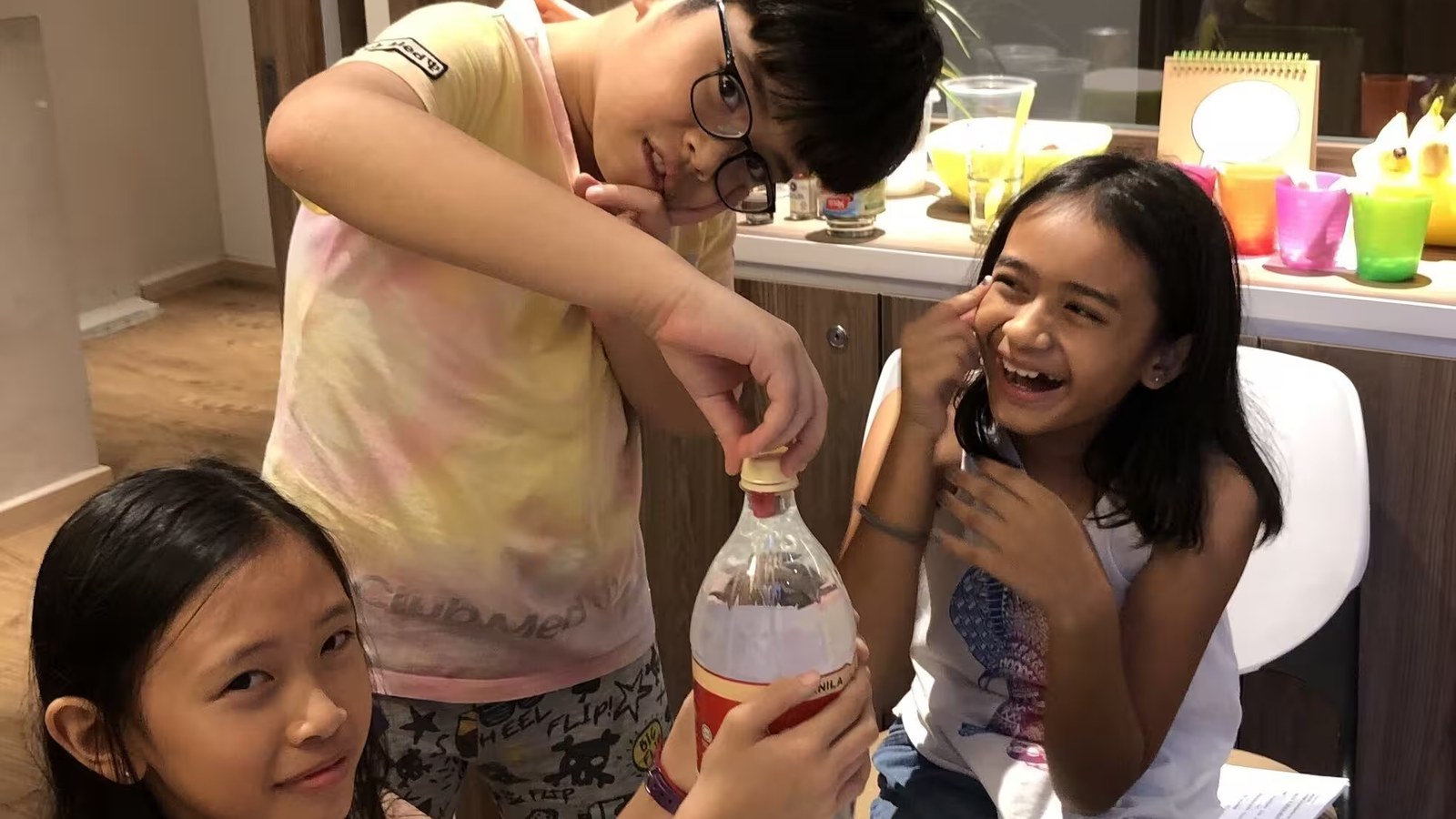 Joyous Learning students doing a science activity together